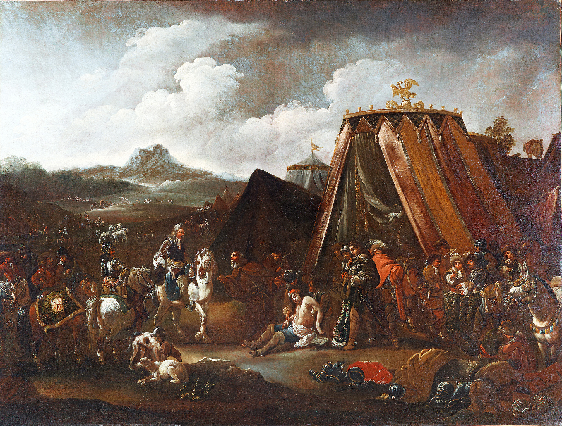 Un dipinto barocco che raffigura una scena militare in un accampamento, probabilmente ambientata durante una campagna bellica storica. Al centro della composizione, un uomo ferito o morente, a torso nudo, è sorretto da alcuni compagni davanti a una grande tenda da campo lussuosa, sormontata da un'aquila dorata. Sulla sinistra, un cavaliere su un cavallo bianco osserva la scena, circondato da altri soldati a cavallo e a piedi in armature d'epoca. Sullo sfondo si estende un paesaggio collinare sotto un cielo nuvoloso e drammatico, dove si intravedono altri reparti dell'esercito in movimento. In primo piano a destra, giacciono a terra elmi, armature e altri equipaggiamenti militari, sottolineando il contesto di battaglia. L'uso di forti contrasti di luce (chiaroscuro) enfatizza la drammaticità del momento.